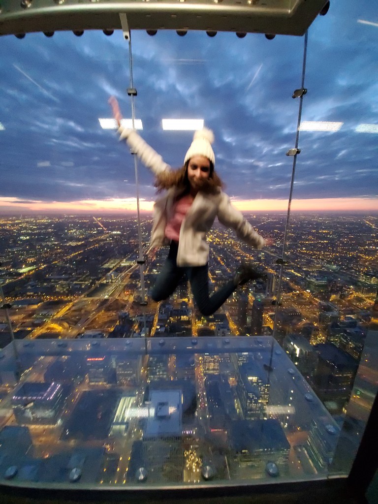 Photo of me jumping on skydeck in Willis Tower in Chicago 